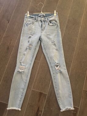 Disclosure Light Wash Distressed Skinny Jeans